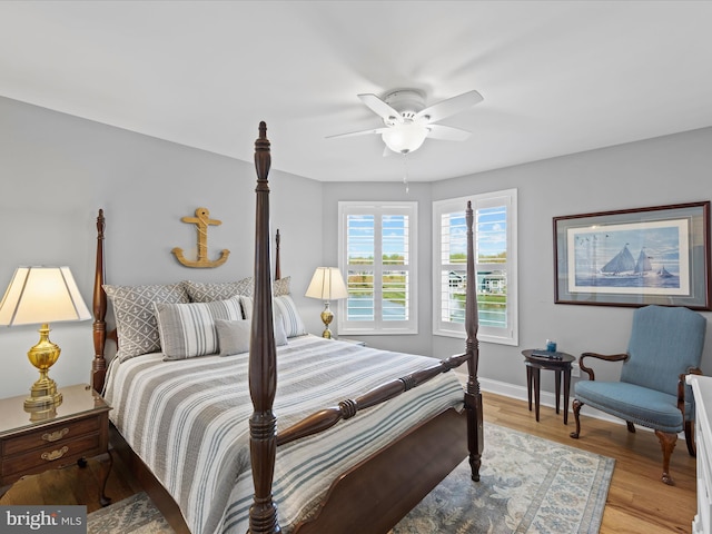 bedroom featuring ceiling fan and light wood-type flooring