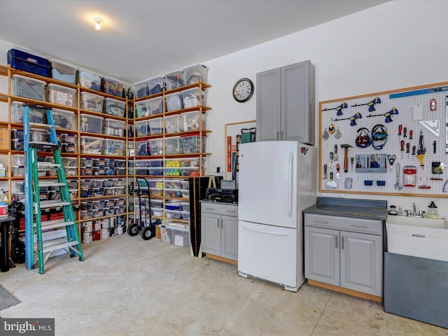 interior space featuring sink and a workshop area