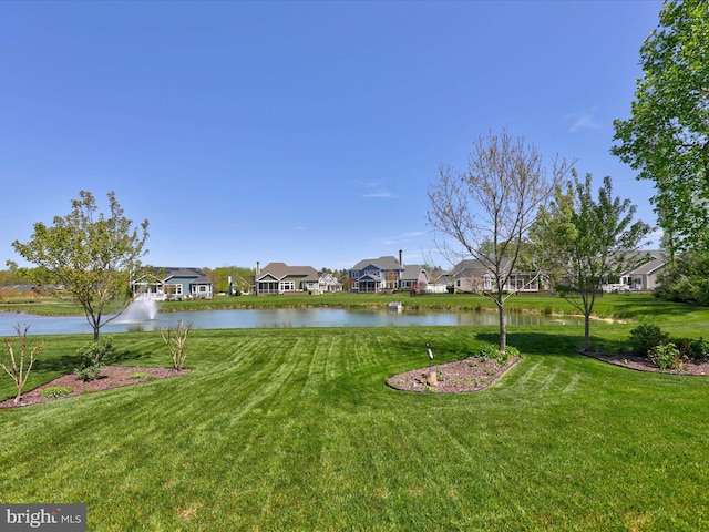 view of yard with a water view