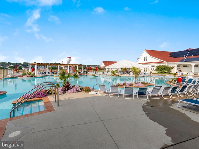 view of pool with a patio area