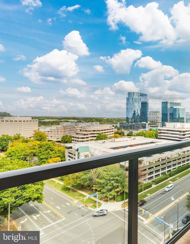 workout area featuring floor to ceiling windows, ceiling fan, plenty of natural light, and carpet flooring