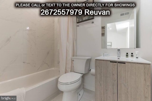 full bathroom with shower / bath combination with curtain, vanity, and toilet