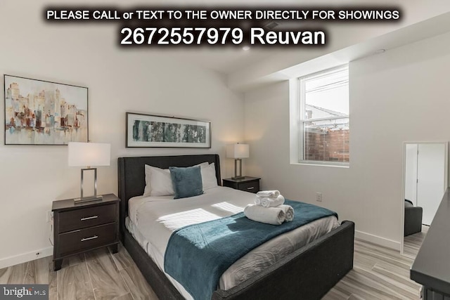 bedroom featuring light hardwood / wood-style floors