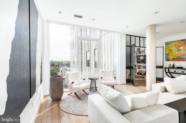 living area featuring light hardwood / wood-style floors