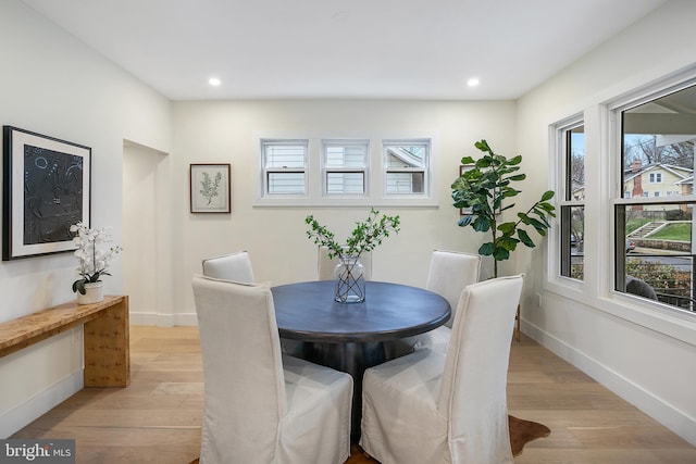 dining room featuring light hardwood / wood-style floors