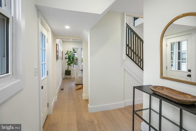 corridor featuring light hardwood / wood-style flooring