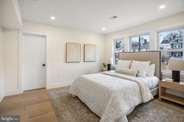 bedroom featuring hardwood / wood-style floors