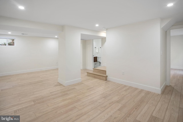 basement with light wood-type flooring