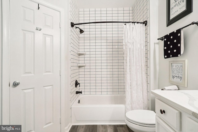 full bathroom with wood-type flooring, vanity, toilet, and shower / bath combination with curtain