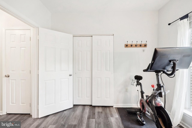 exercise area with hardwood / wood-style flooring