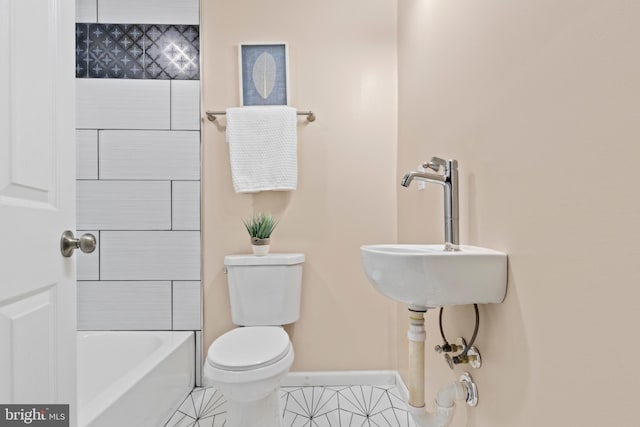 bathroom with separate shower and tub, toilet, and tile patterned floors