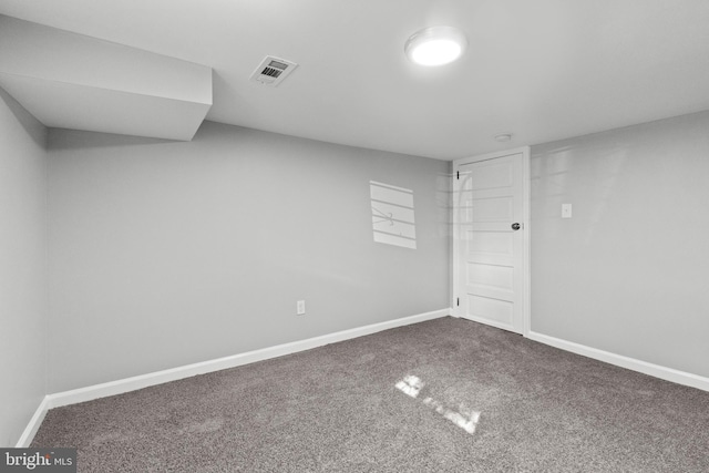 empty room featuring carpet floors