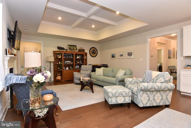 living room featuring coffered ceiling, dark hardwood / wood-style floors, and beam ceiling