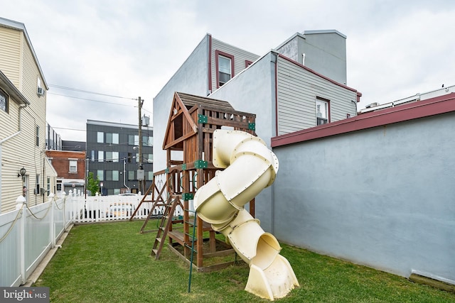 view of jungle gym featuring a yard