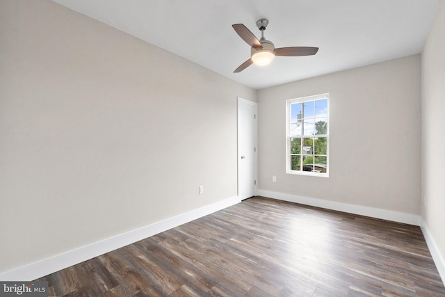 spare room with ceiling fan and hardwood / wood-style floors