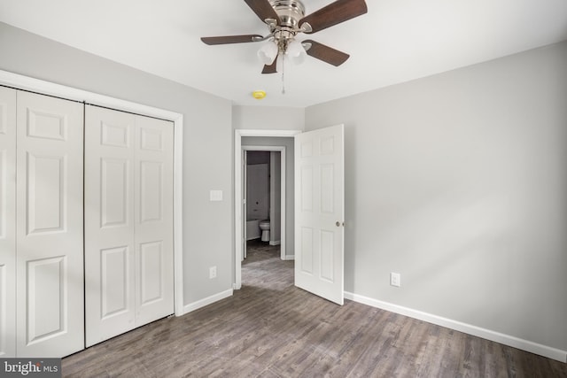 unfurnished bedroom featuring a closet, wood-type flooring, and ceiling fan