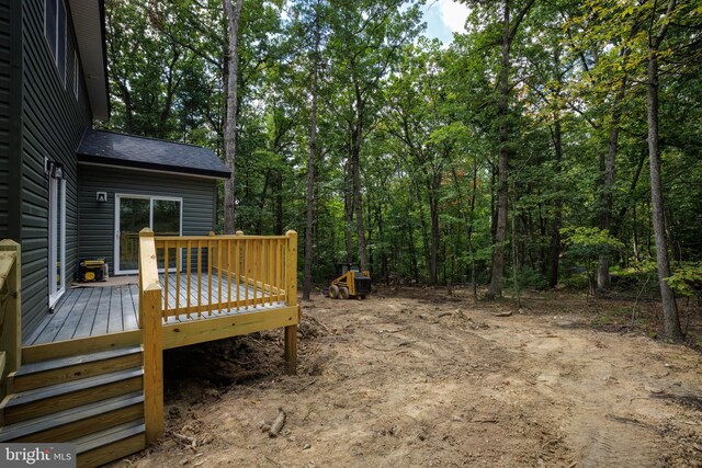 view of yard with a deck