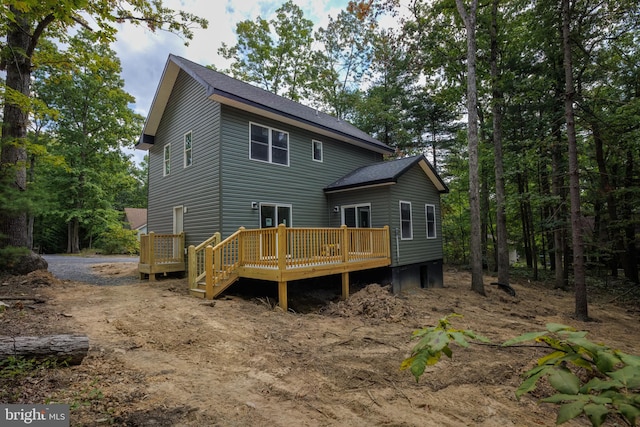 rear view of property with a deck