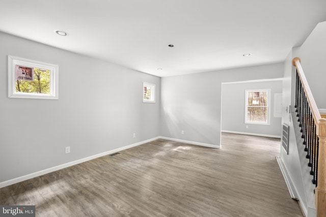 spare room with hardwood / wood-style flooring