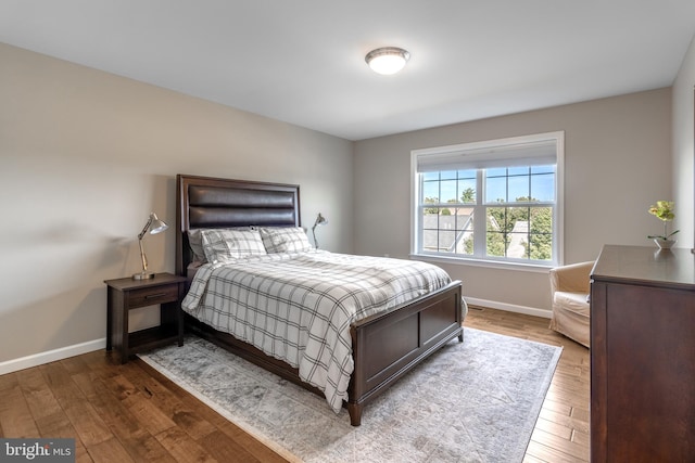 bedroom featuring dark wood-type flooring