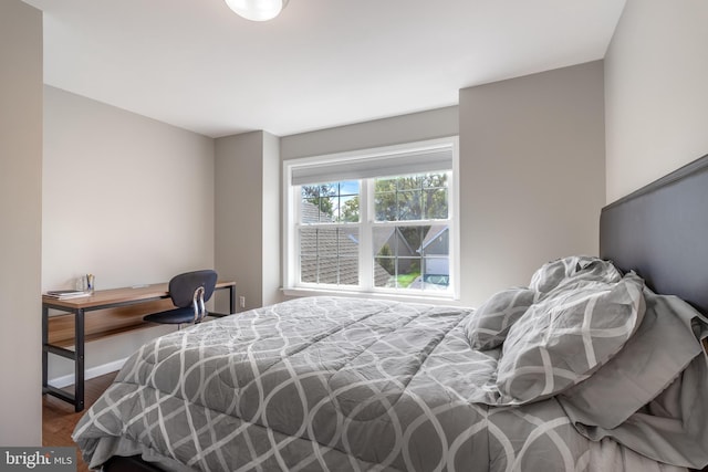 bedroom featuring hardwood / wood-style flooring