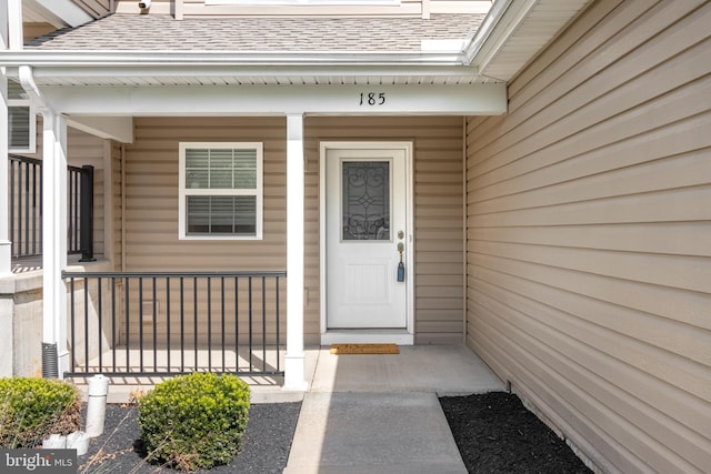 property entrance with a porch