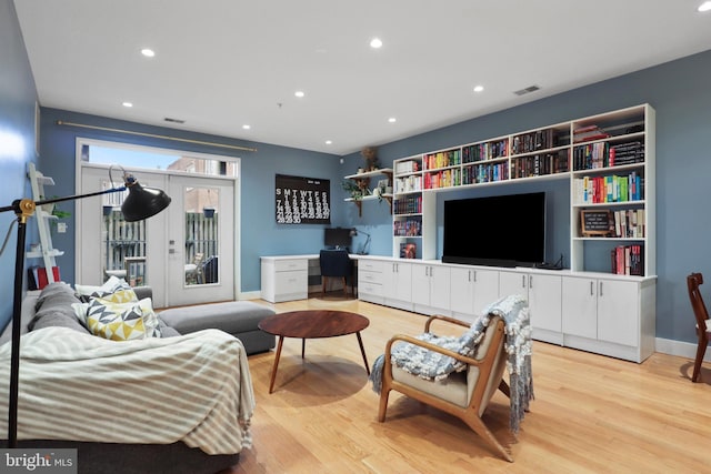 living room with light hardwood / wood-style floors