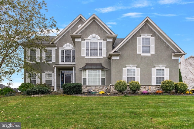 front of property featuring a front yard