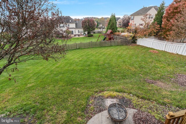 view of yard with a playground