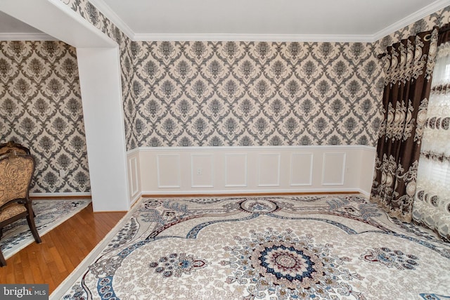 interior space featuring light hardwood / wood-style flooring and crown molding