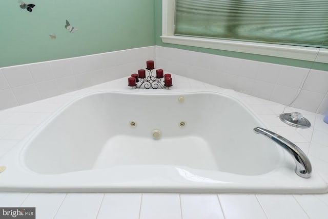 interior space with tiled bath