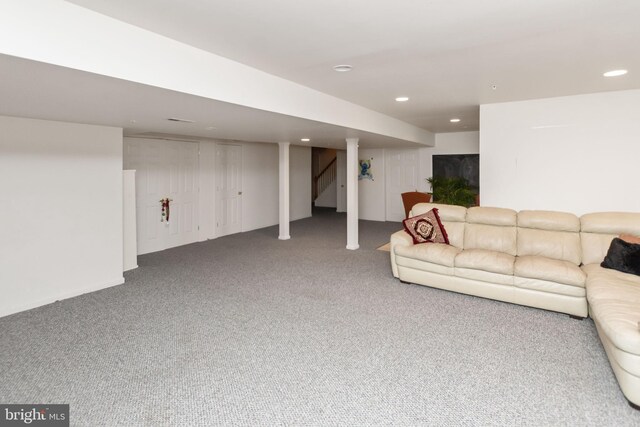 unfurnished living room with carpet