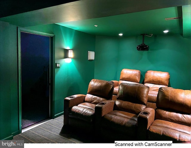 cinema room featuring carpet floors