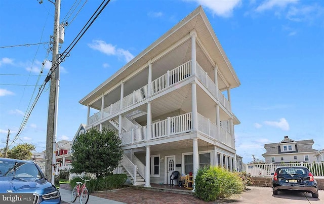 view of front of house with a balcony