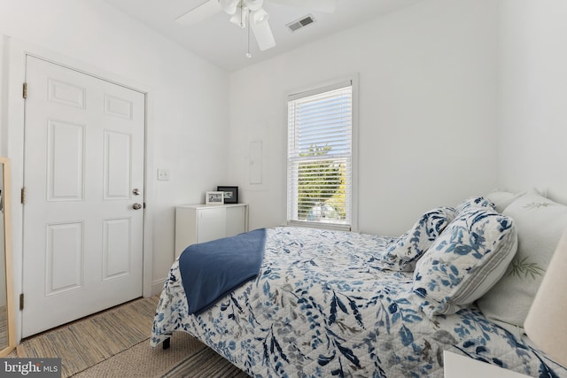 carpeted bedroom with ceiling fan