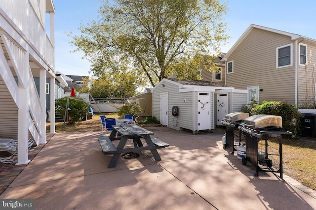 view of patio / terrace with a storage unit