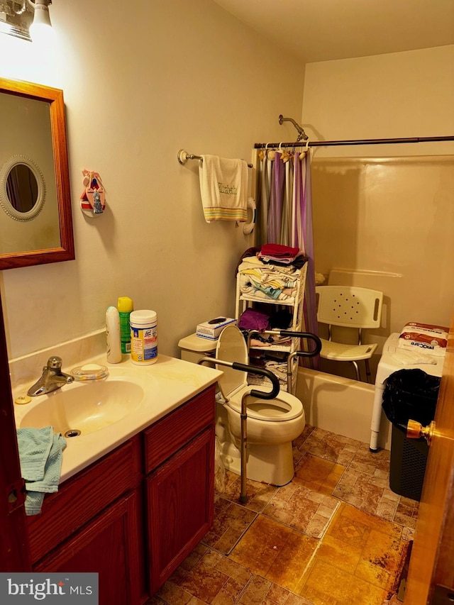 full bathroom featuring vanity, toilet, and shower / bath combo with shower curtain