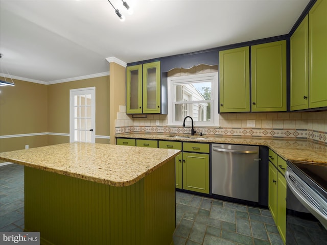 kitchen with light stone countertops, stainless steel appliances, a center island, and sink