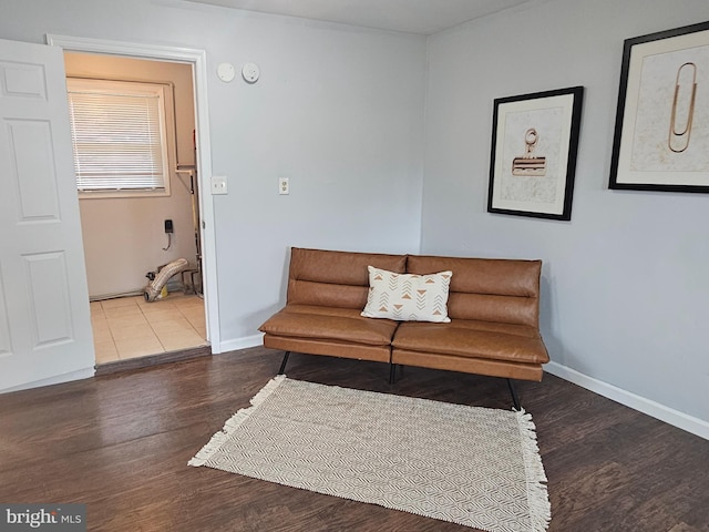 sitting room with hardwood / wood-style floors