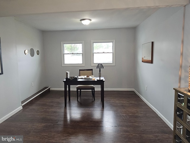 office space featuring dark wood-type flooring