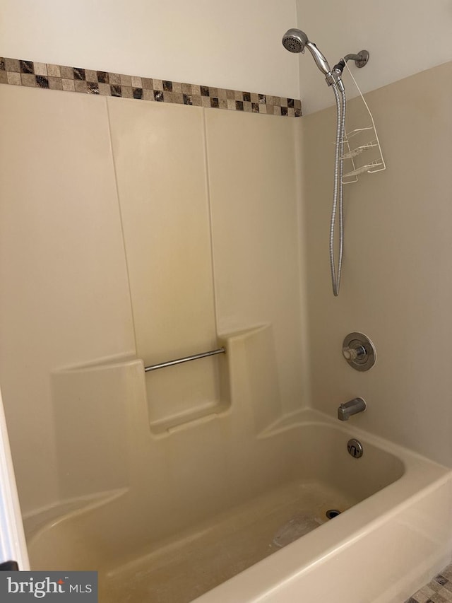 bathroom with shower / bath combination