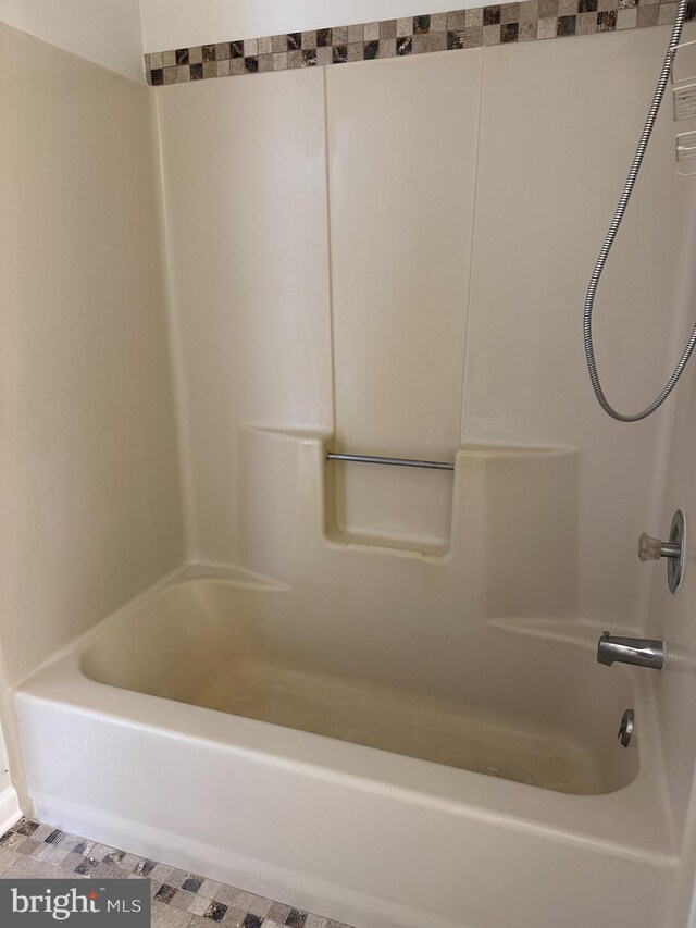 bathroom featuring shower / washtub combination