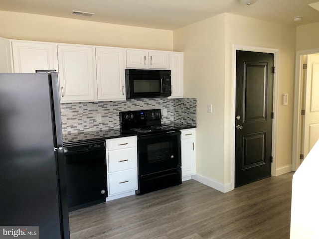 kitchen featuring white cabinets, backsplash, dark hardwood / wood-style floors, and black appliances