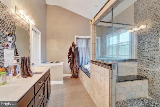 bathroom with vanity, lofted ceiling, a shower with shower door, a chandelier, and tile patterned floors