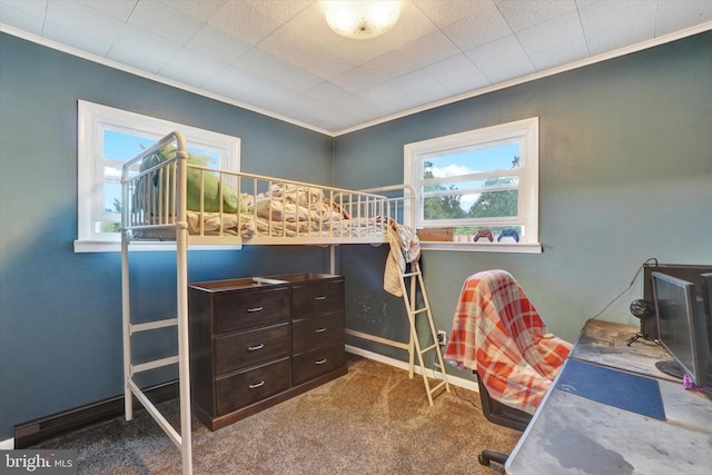 carpeted bedroom with ornamental molding