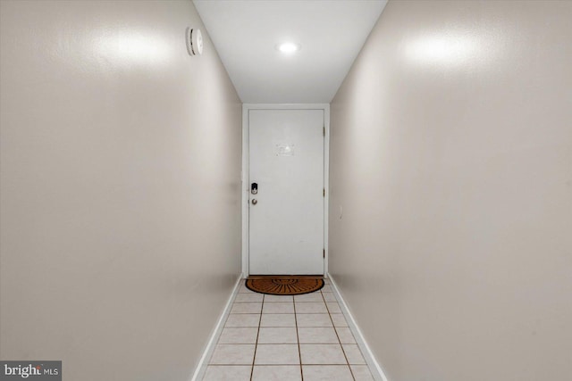 doorway featuring light tile patterned floors