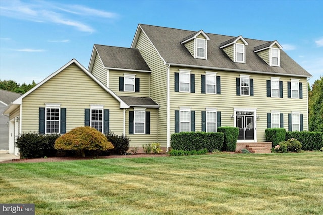 view of front facade with a front yard