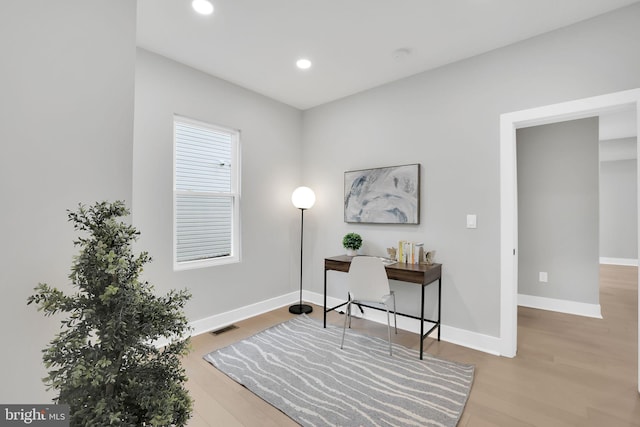 sitting room featuring light wood-type flooring