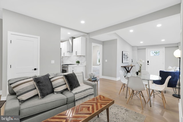 living room with light hardwood / wood-style floors