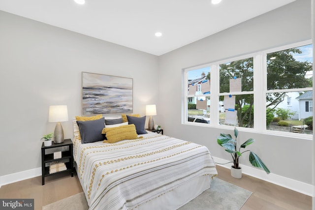 bedroom featuring hardwood / wood-style floors